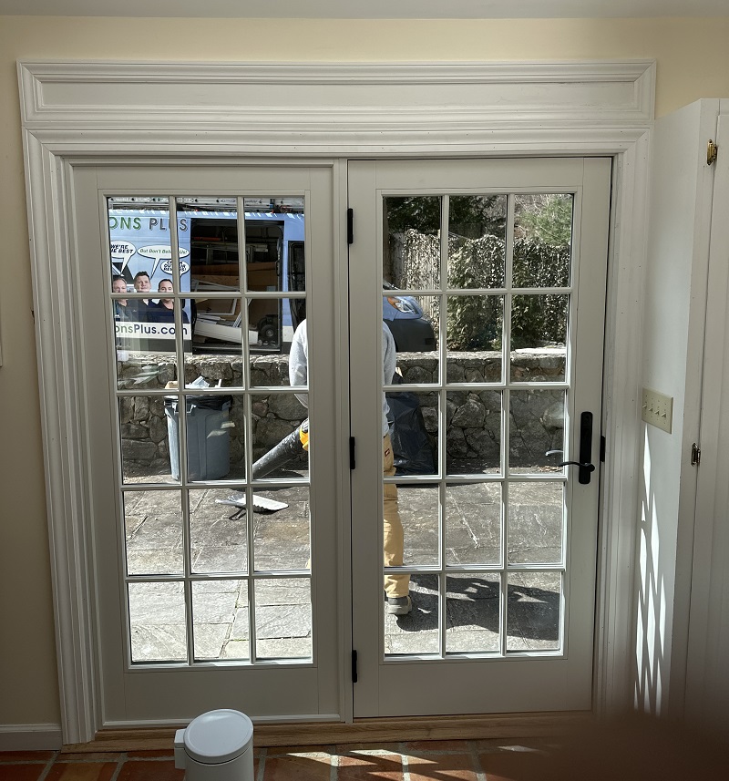 Andersen 400 Series Woodwright double hung windows with a prefinished pine interior and FDL authentic grids